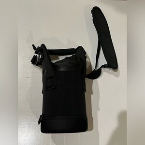 Black water bottle pouch with shoulder strap and carry handle